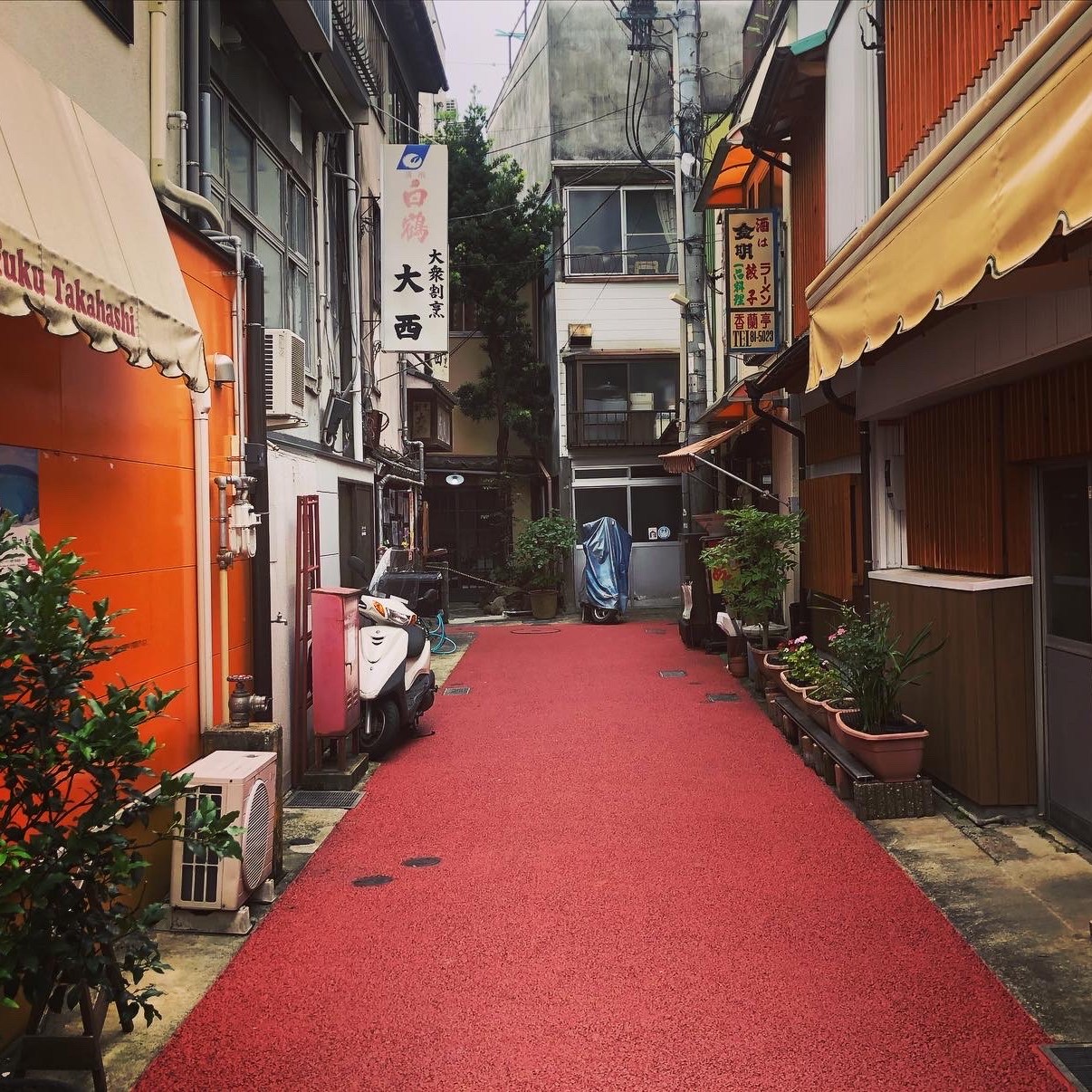 a colorful street in Atami, Japan